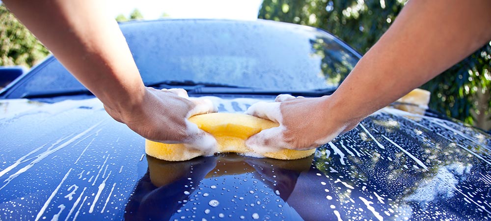 Hand Wash of Car with Sponge